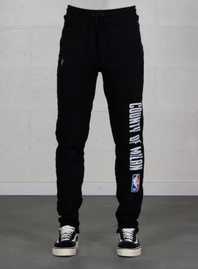     -MARCELO BURLON    -PANTALONE NBA-